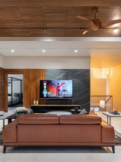 A similar perspective of the family room, emphasizing the flow into the adjacent bedroom. The design ensures that even distinct spaces feel connected, creating a harmonious living experience.