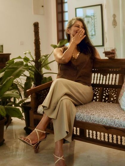 A candid, happy moment in the waistcoat and trousers. Comfort is key, and this outfit is perfect for feeling at ease while still looking stylish.