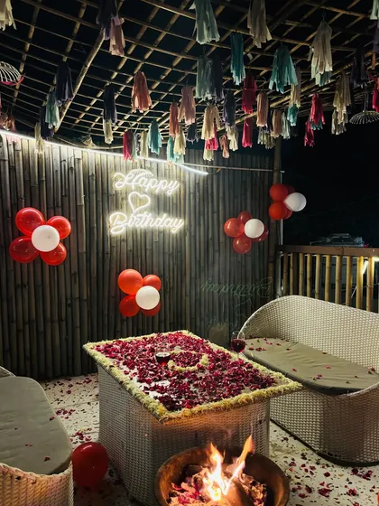I believe birthdays should be extra special. Here’s a cozy birthday setup I did, complete with a flower-covered table, balloons, and a personal bonfire to keep you warm. Let me know your vision, and I'll bring it to life.