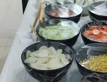 A shot of our pre-portioned and covered salad ingredients, ensuring hygiene and freshness for every corporate event.