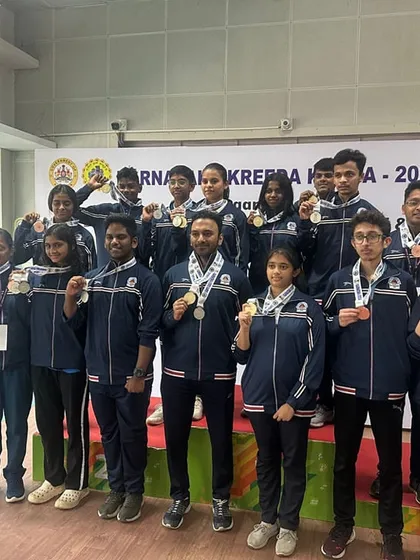 This is what a winning team looks like. Our athletes celebrating their success at the State Games. We foster a supportive team environment where every shooter's achievement is a collective victory.