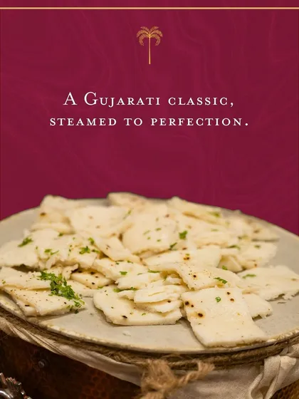 A Gujarati classic, steamed to perfection. Our white dhokla is soft, spongy, and delicate, served with the perfect chutneys to add a touch of heritage to your event.