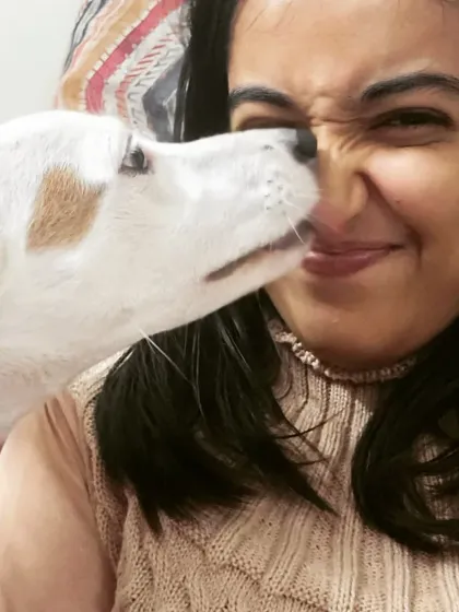 Getting selfies with a puppy is a lesson in patience and a whole lot of kisses. Working with puppies is about embracing their playful energy while gently guiding them on how to interact appropriately.