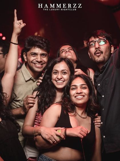 Happy faces in the crowd at Hammerzz, enjoying the music.