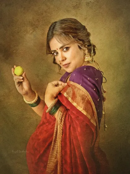 A modern muse in a classical frame. This portrait is part of my Raja Ravi Varma series, focusing on the expressive power of posture and gaze, transforming a photograph into a piece of fine art that honors Indian aesthetics.