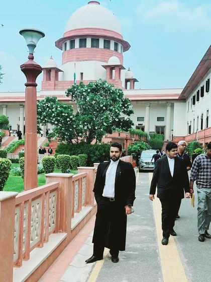 Walking through the Supreme Court grounds with colleagues. Collaboration is a vital part of building a strong case.