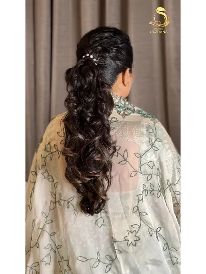 Another angle of the textured ponytail, showing the beautiful highlights in the hair.