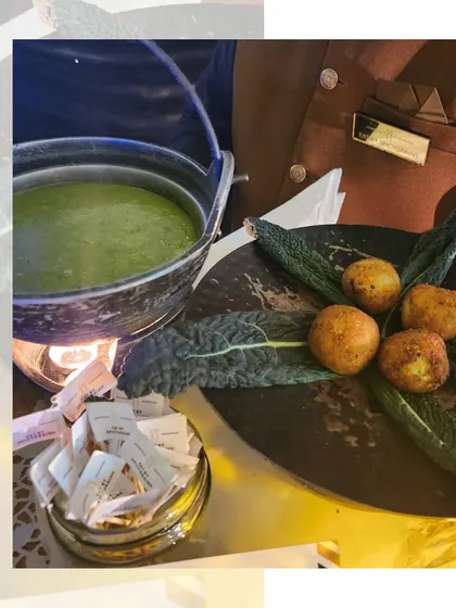 A creative presentation of Sarson da Saag with Makki di Roti. The winter classic is served as a fondue, with potato bites for dipping, all kept warm over a small flame.