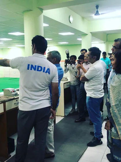 It was an honor to host a team from the Delhi judiciary. Here, I am demonstrating the proper shooting stance and technique before they try their hand at air pistol and rifle shooting.