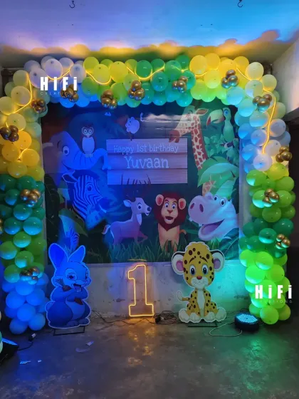 The same jungle setup under different lighting, showing how we use lights to create a fun party atmosphere.