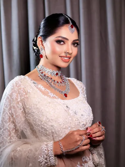 A modern bride looking absolutely angelic in a white and red diamond ensemble. This look is a perfect example of my signature soft-glam style, with a clean, radiant base and beautifully defined eyes.