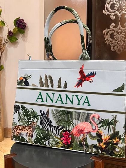 This jungle-themed suede velvet tote bag is another one of our beautiful designs. We can personalise it with your name in a contrasting color.