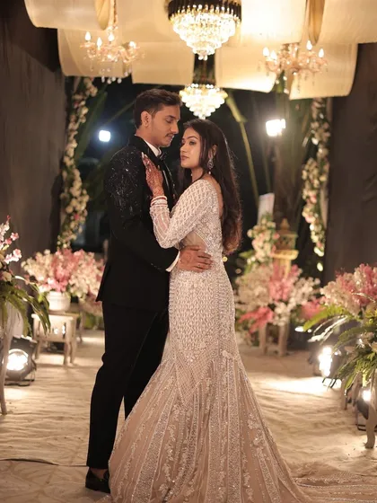 A romantic couple portrait from the reception. The bride's makeup is glamorous and glowing, perfect for her fairytale evening.