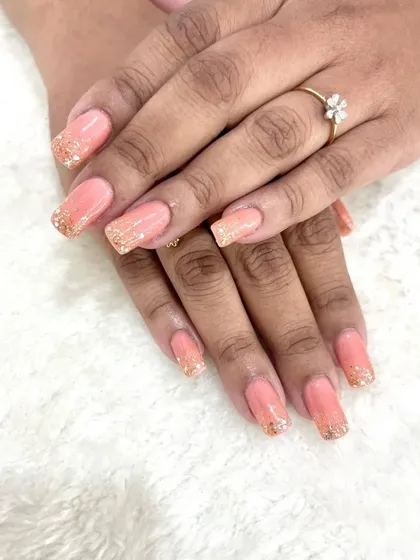Another look at these gorgeous peach and glitter bridal nails, showing the square shape and flawless application.