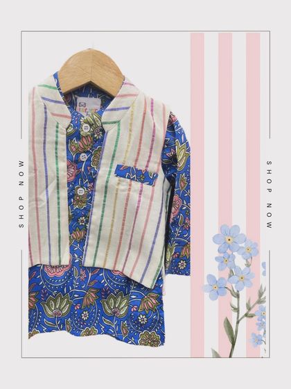 A detailed shot of the boys' twinning set, featuring a blue floral kurta and a multi-color striped bandi jacket, made from 100% soft cotton.