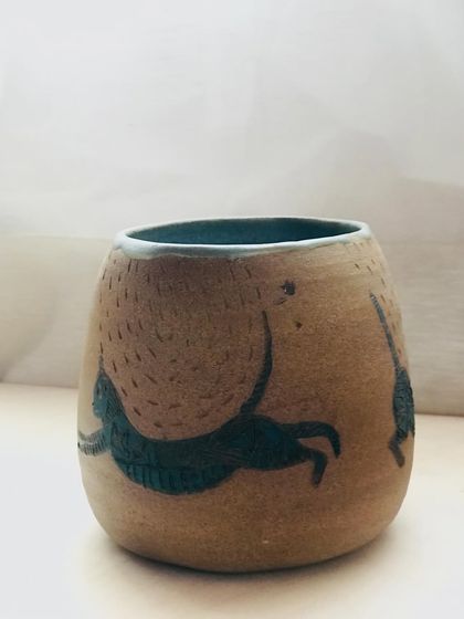 Another angle of the "Midnight Mischief" bowl, capturing the whimsical movement of the hand-carved cats.