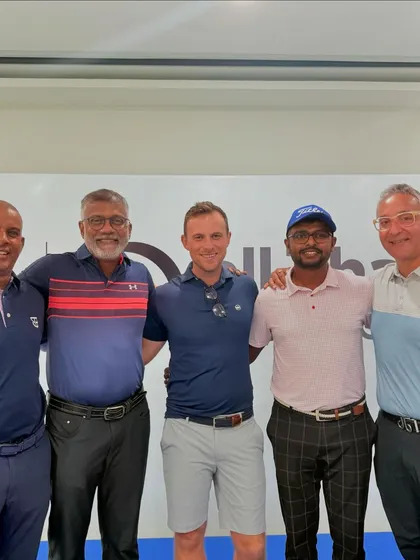 My team and I with international coaches at a seminar. Building a global network and learning from the best is a key part of my strategy.