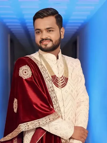 Here is a classic groom look for a traditional wedding ceremony. The focus is on clean skin and subtle enhancement to complement the groom's sherwani and accessories, ensuring he looks regal and polished.