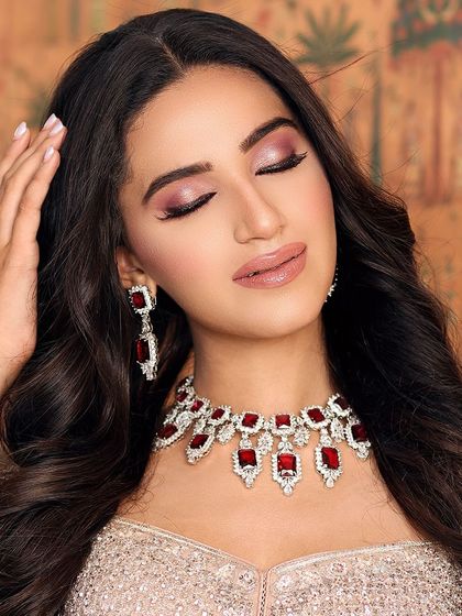 Eyes closed, this shot highlights the beautiful pink and purple tones of the eyeshadow.