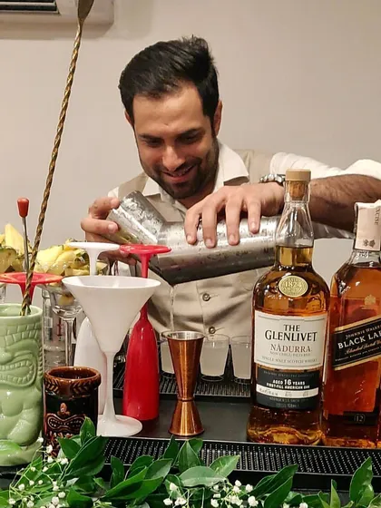 One of our founders, Areez, doing what he does best: crafting delicious cocktails with a smile. His passion for mixology is at the heart of our business.