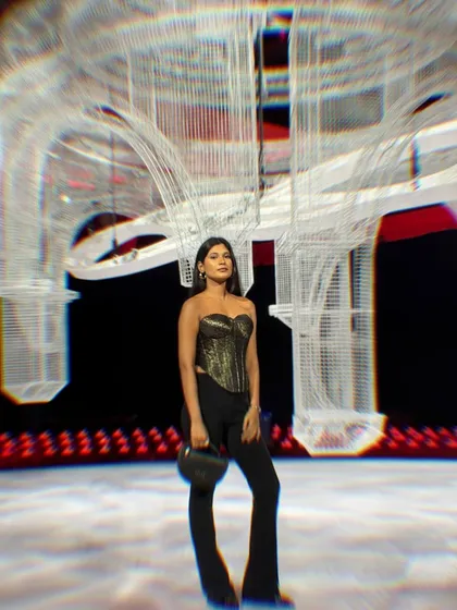 Standing in front of one of the incredible art installations at the show. My outfit was designed to be both chic and comfortable enough to navigate a busy event.