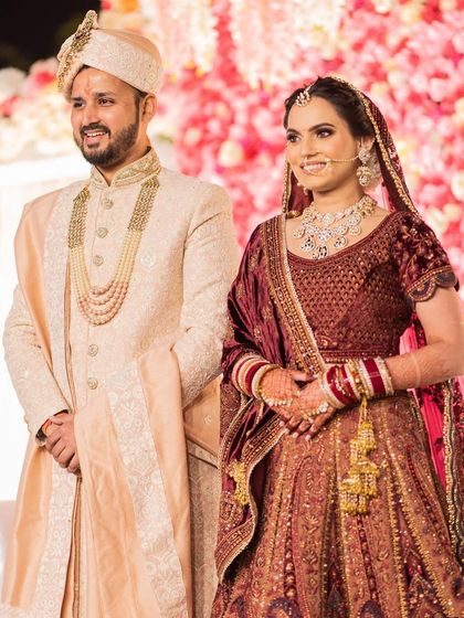 Shubhangi's wedding photos. I created a soft, romantic look with a messy braided bun and flawless makeup that lasted all night.
