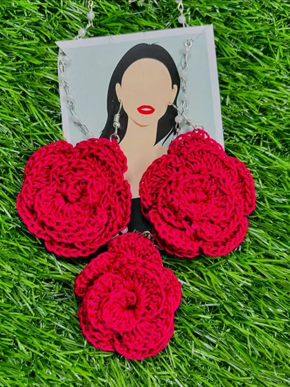 My classic red rose crochet jewelry set, featuring a floral pendant necklace and matching earrings. Each piece is carefully handcrafted from soft cotton thread, offering a bold and romantic look.