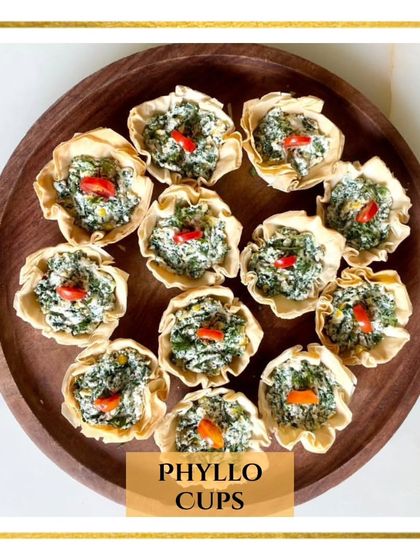 Our Veg Phyllo Cups are a bite-sized burst of deliciousness. These crispy, flaky shells are filled with a savory vegetable mixture, making them a perfect party starter.