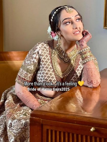 More than a look, it's a feeling. A thoughtful portrait of the bride, lost in the moment, her beautiful mehendi adding to the dreamy and emotional atmosphere.