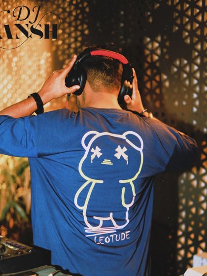 A shot from behind the console, showing off my Leotude shirt. Even when I'm focused on the music, I like my style to be on point.