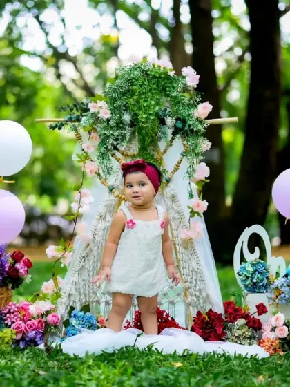 Standing tall in her outdoor wonderland. This setup is perfect for a dreamy and whimsical photoshoot.