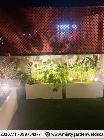 The combination of different plants in the FRP pots adds texture and interest to the terrace garden. The PVC lattice provides a uniform and private backdrop.