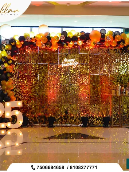 Turning 25 is a milestone worth celebrating in style. We designed this glamorous birthday setup featuring a glittering gold sequin wall, a balloon arch, and large marquee lights for a truly festive and photo ready party.