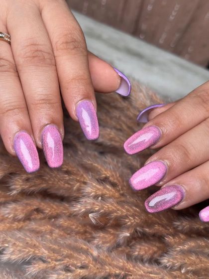 This shot shows the smooth transition of the glitter ombre. I carefully blend the colors to ensure a seamless and professional finish.