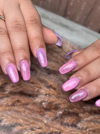 This shot shows the smooth transition of the glitter ombre. I carefully blend the colors to ensure a seamless and professional finish.