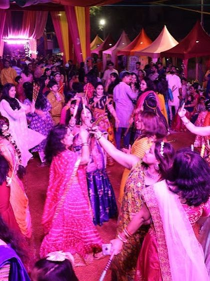 The crowd in full swing at the Dandiya celebration. A packed dance floor is the sign of a successful event.