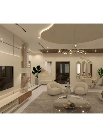 Another perspective of the contemporary living room, emphasizing the track lighting and the abstract art that adds a splash of color and personality to the neutral space.