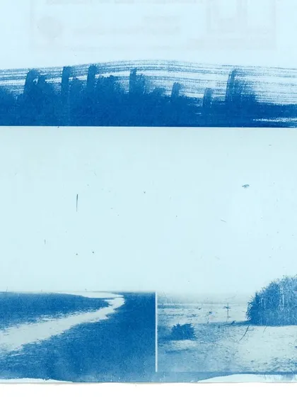 A close-up of the desolate landscape captured in a cyanotype print on an inland letter. The brushstrokes and deep blue tones elevate the humble stationery into a work of art.