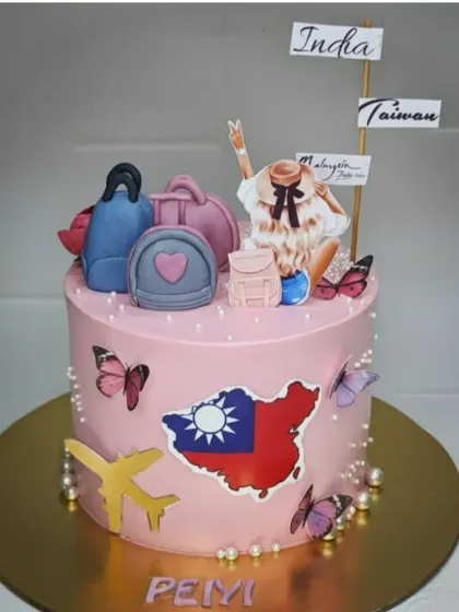 A travel-themed cake for a globetrotter. This chocolate coffee mousse cake is decorated with fondant backpacks, maps, and butterflies, celebrating a love for adventure.