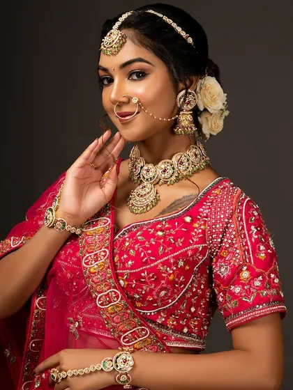 A beautiful three-quarter portrait, capturing the bride's smile and the elegance of her attire.