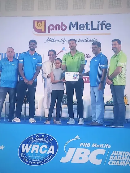 Our player Akshita receiving her award after securing 3rd place in the U-11 Girls Singles category at the PNB Metlife JBC Badminton Championships.