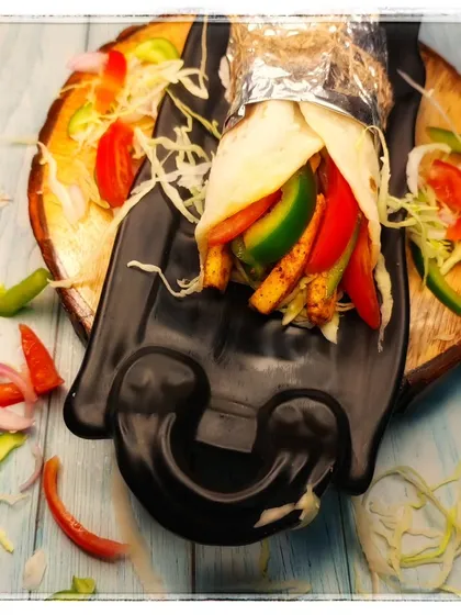 I teach modern, in-demand street food concepts like this delicious Paneer Shawarma. The presentation and flavor profile are designed for commercial success in a cafe or food truck setting.