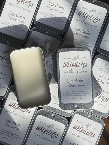 Our lip balms in their new sliding tins. They are made with nourishing oils like coconut and sweet almond, plus mango butter for a light, non-greasy feel.