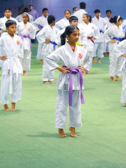Students stand at attention, displaying the discipline and readiness that is a hallmark of our training at OSK Academy.