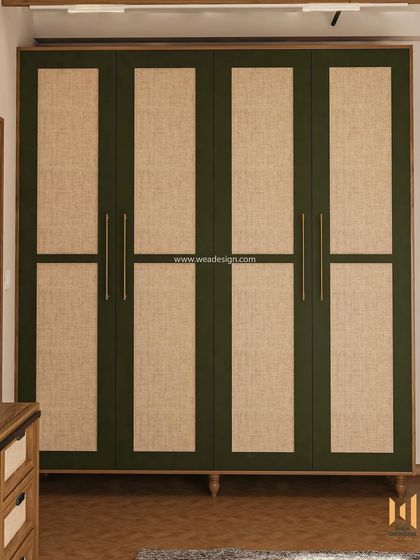 The wardrobe in the industrial-vintage room features green PU-painted frames with fabric-clad panels, adding texture and color.