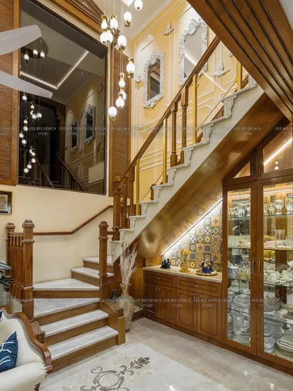 A view of the staircase from image 246, showing the custom-built crockery unit tucked underneath.