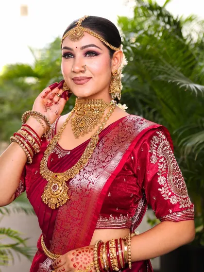 A candid, happy moment. The bride's makeup is designed to look fresh and glowing, capturing her joy and radiance on her special day.
