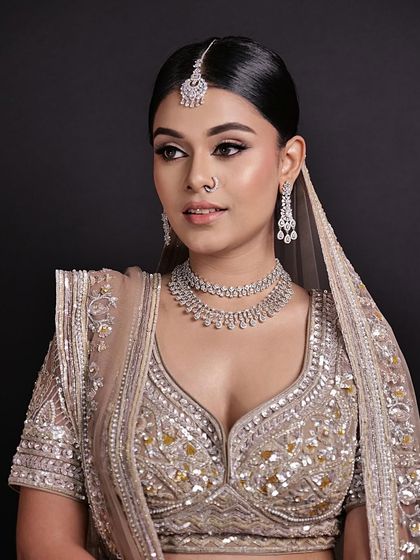 A closer look at this minimal bride. The focus is on her radiant skin and the subtle enhancement of her features, creating a look that is effortlessly beautiful.