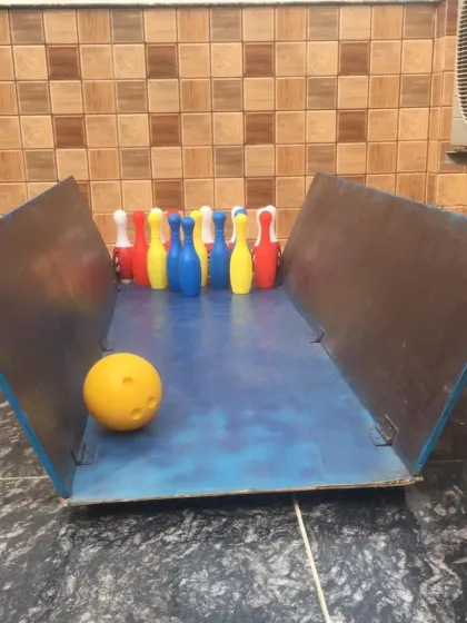 I also offer a variety of tabletop games for party entertainment. This mini bowling alley is easy to set up anywhere and provides fun for guests of all ages.