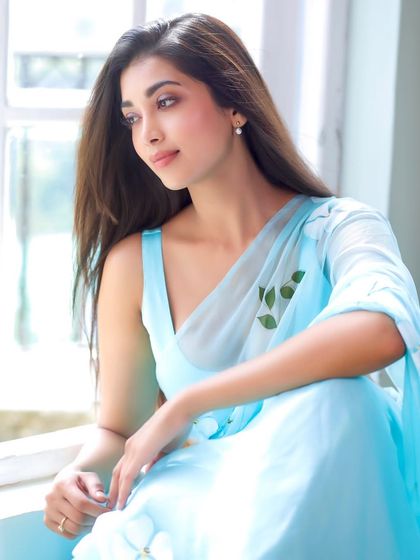 Another shot from the same series, with the soft makeup look catching the natural light beautifully. This style is perfect for clients who want to look polished yet completely themselves.